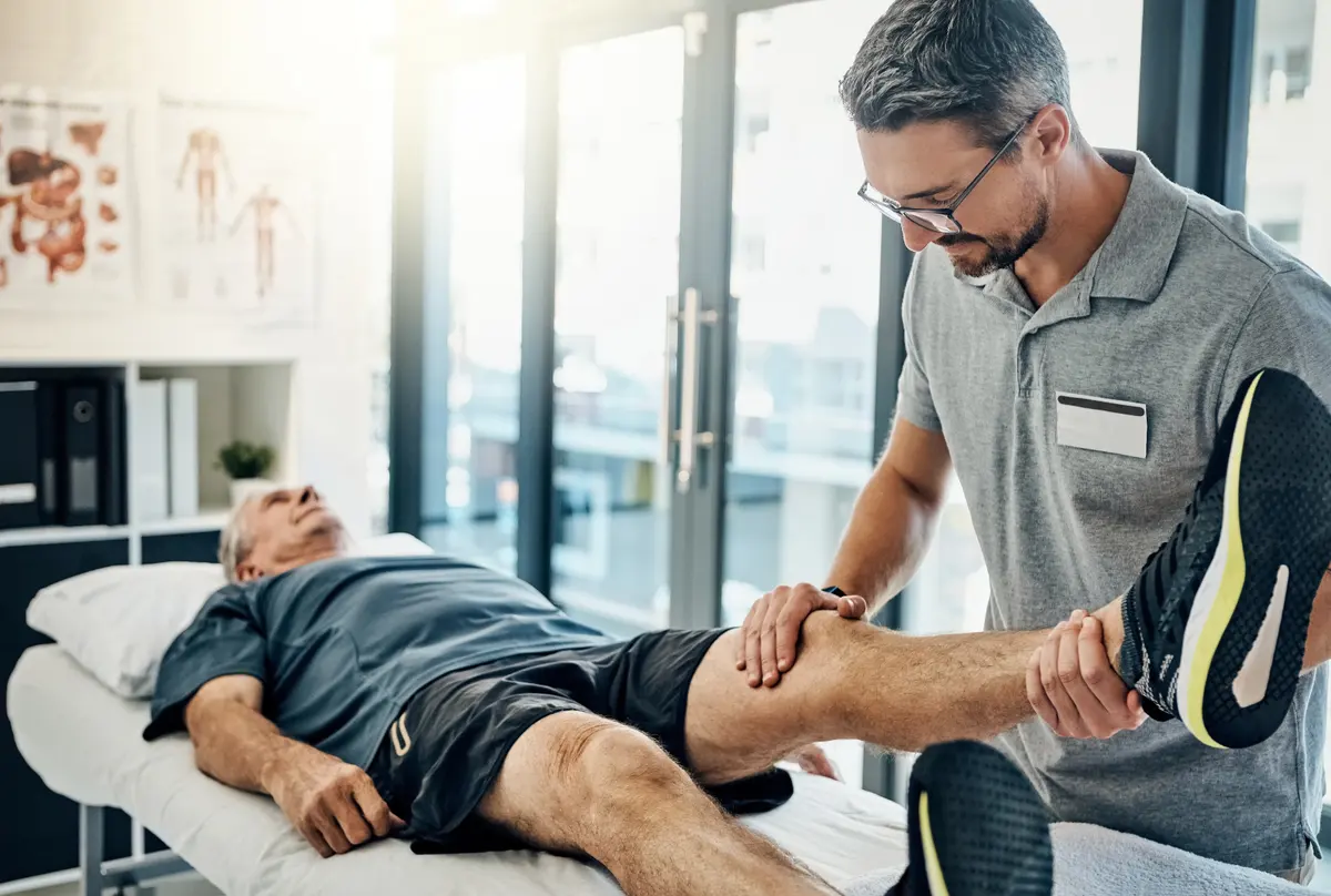 Physical Therapy Care at OrthoMD Physical Therapist working with a patient